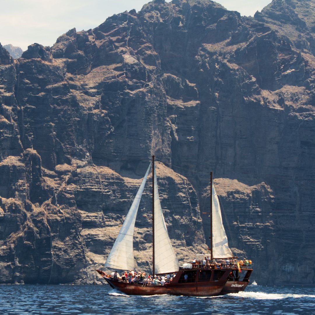 sailing ship under the cliffs of Los Gigantes