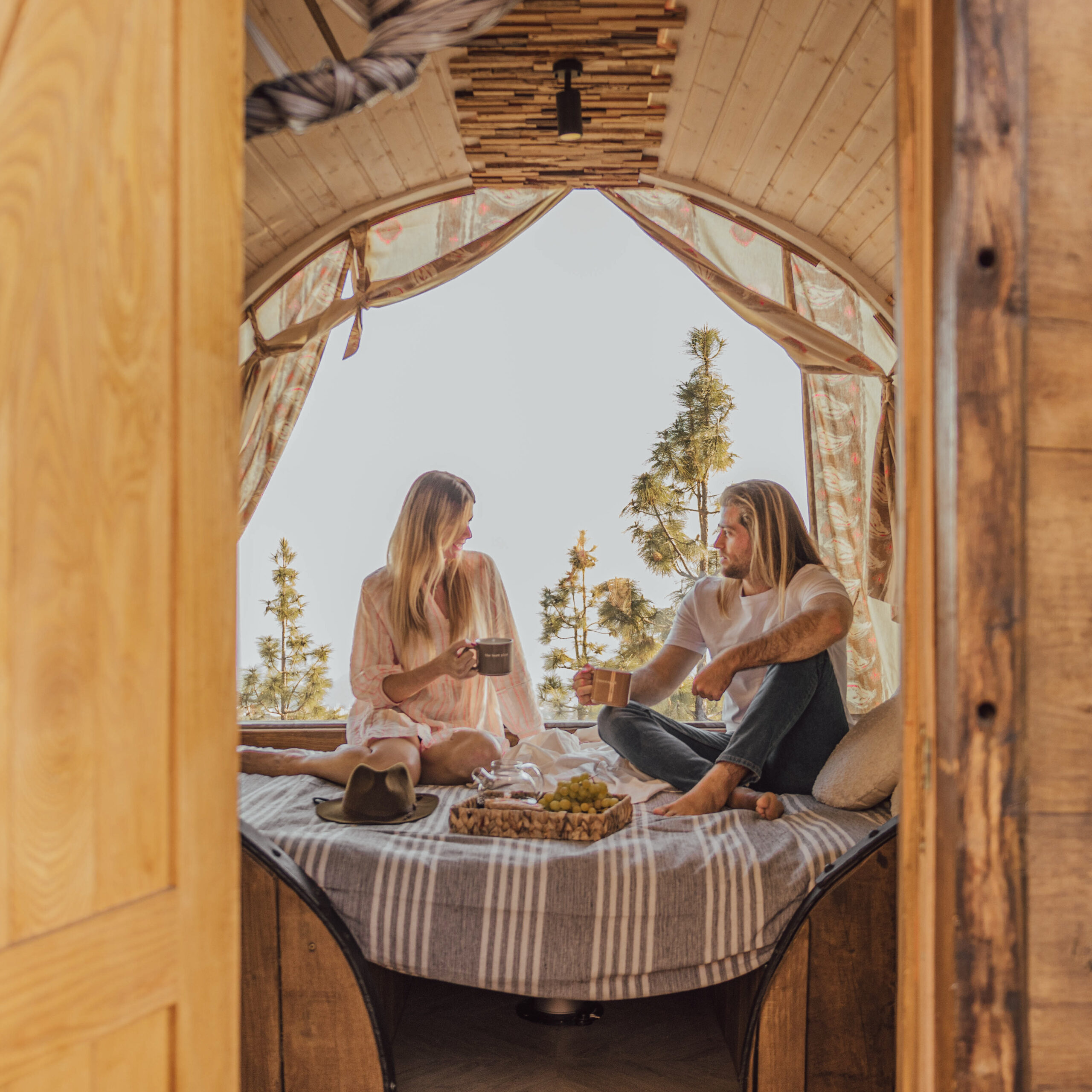 Barrel lodging in Tenerife, overlooking the ocean surrounded by green hills